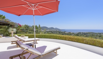 Resa Estates modern villa for sale te koop Cala Tarida Ibiza day beds and views.jpg